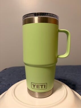 Yeti lime green insulated travel mug with handle and magnetic slide top lid